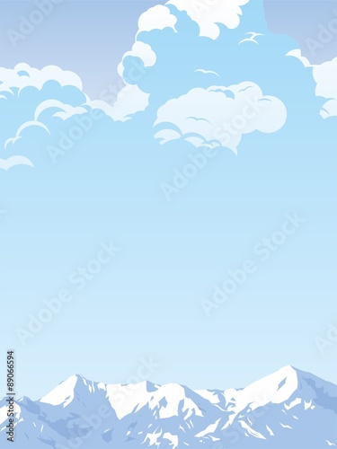 Mountains in the background of the sky with clouds