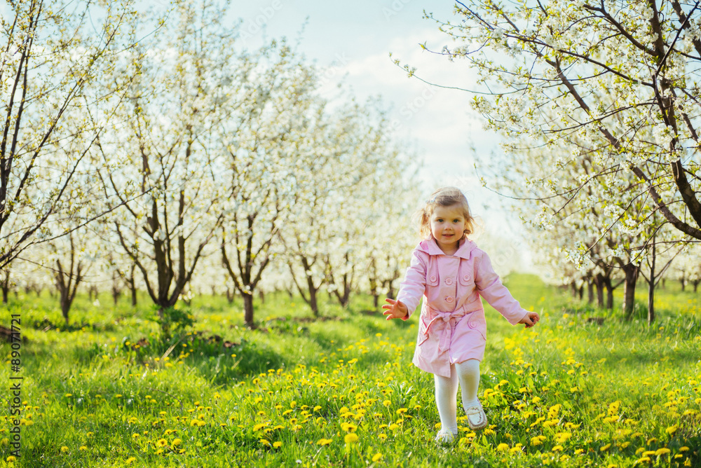 child outdoors in the blossom trees. Art processing and retouchi child outdoors in the blossom trees. Art processing and retouchi
