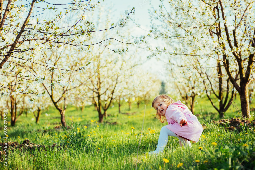 child running outdoors blossom trees. Art processing and retouch child running outdoors blossom trees. Art processing and retouch