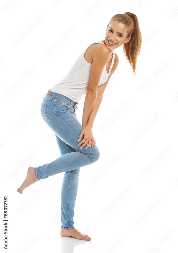 Young girl in jeans and a white t-shirt
