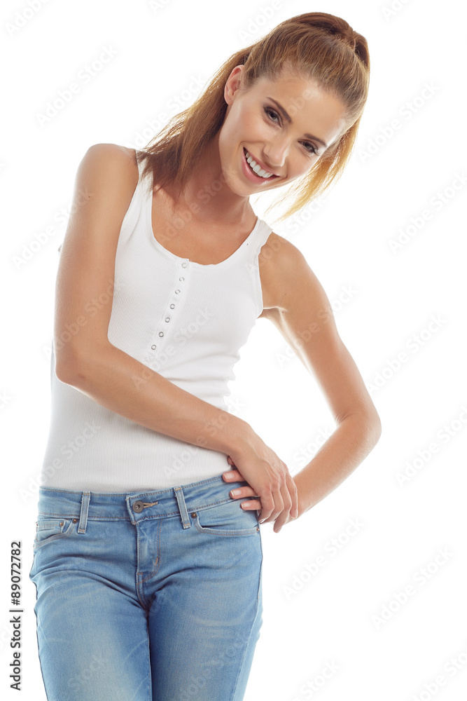 Young girl in jeans and a white t-shirt Young girl in jeans and a white t-shirt