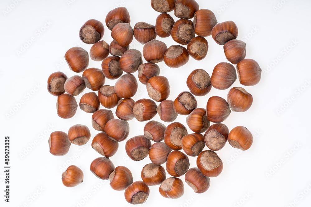 Pile of hazelnuts isolated on white background Pile of hazelnuts isolated on white background
