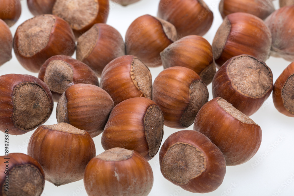 Pile of hazelnuts isolated on white background Pile of hazelnuts isolated on white background