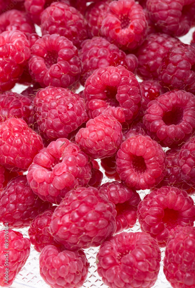 A beautiful selection of freshly picked ripe red raspberries. A beautiful selection of freshly picked ripe red raspberries.