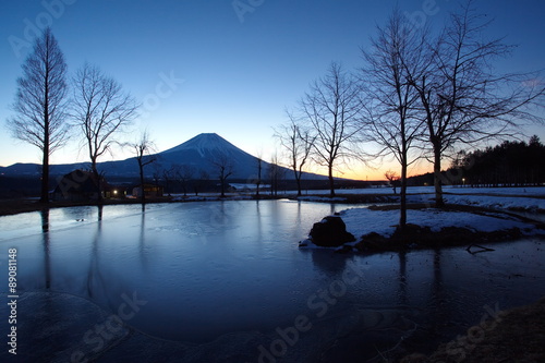 Mountain Fuji during sunrise with small lake at Fumoto para camping ground photo