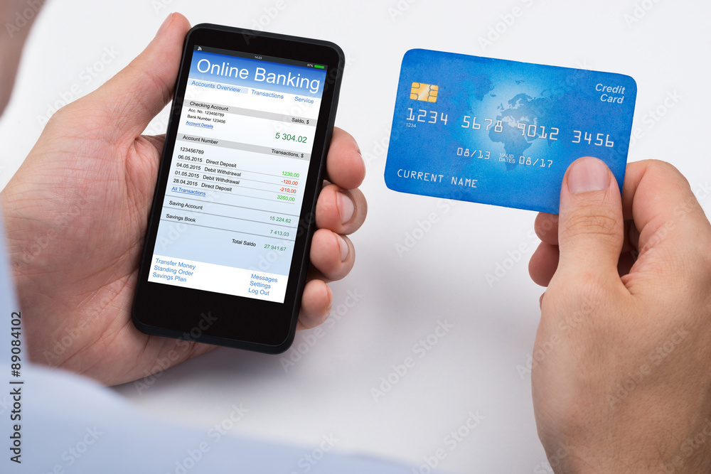 Person With Credit Card And Mobile Phone Person With Credit Card And Mobile Phone