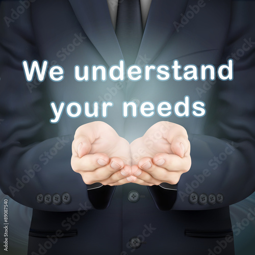 businessman holding we understand your needs words Fototapet