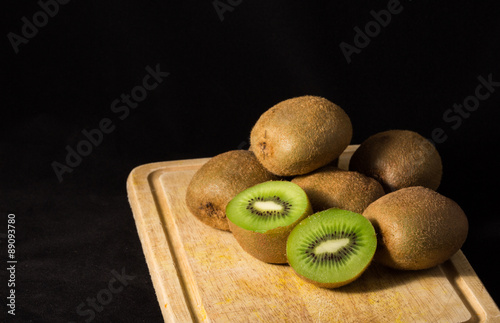 Kiwi fruit isolated on black