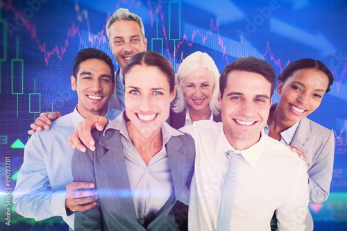 Composite image of happy business people looking at camera 
