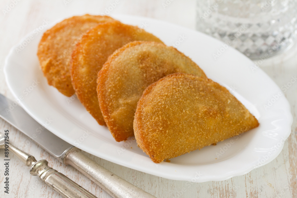 meat cookies on white dish on white background meat cookies on white dish on white background