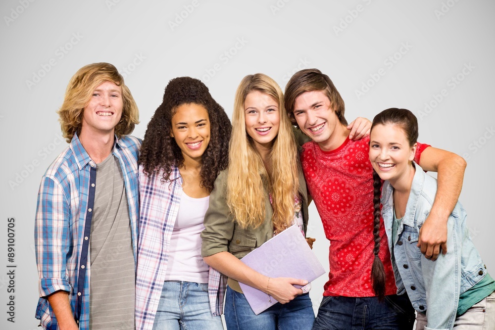 Composite image of cheerful college students in library Composite image of cheerful college students in library