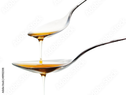 Honey in spoons