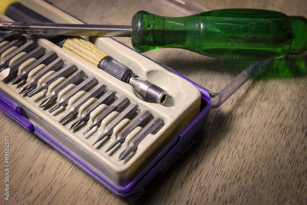 screwdriver set on wood background