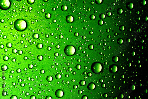 Water drops closeup. Abstract green background  © Subbotina Anna