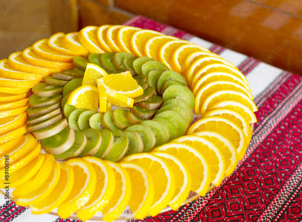 Beautiful scenery of fruit with orange, lemon, kiwi on wooden background