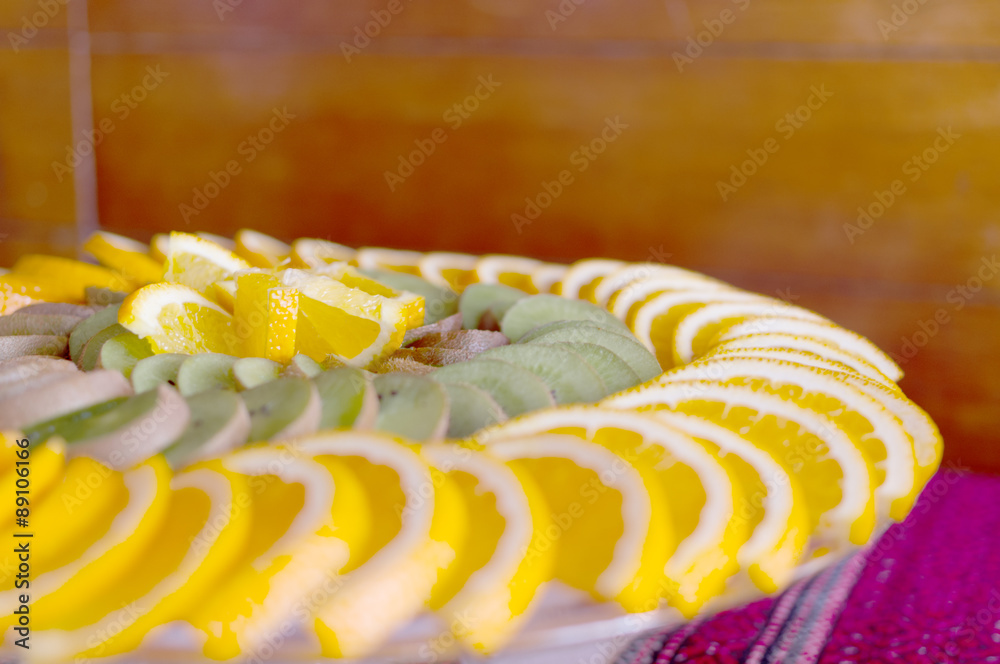 Beautiful scenery of fruit with orange, lemon, kiwi on wooden background