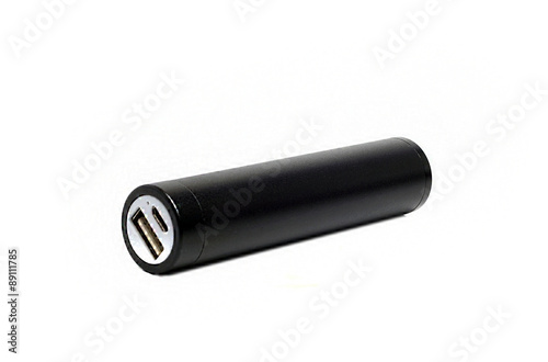 external battery in a black metal cylinder