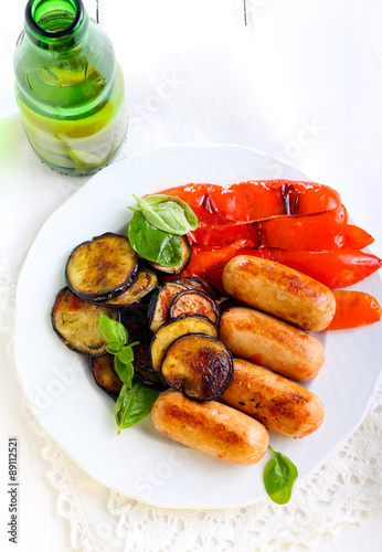 Roasted sausages, aubergine and pepper