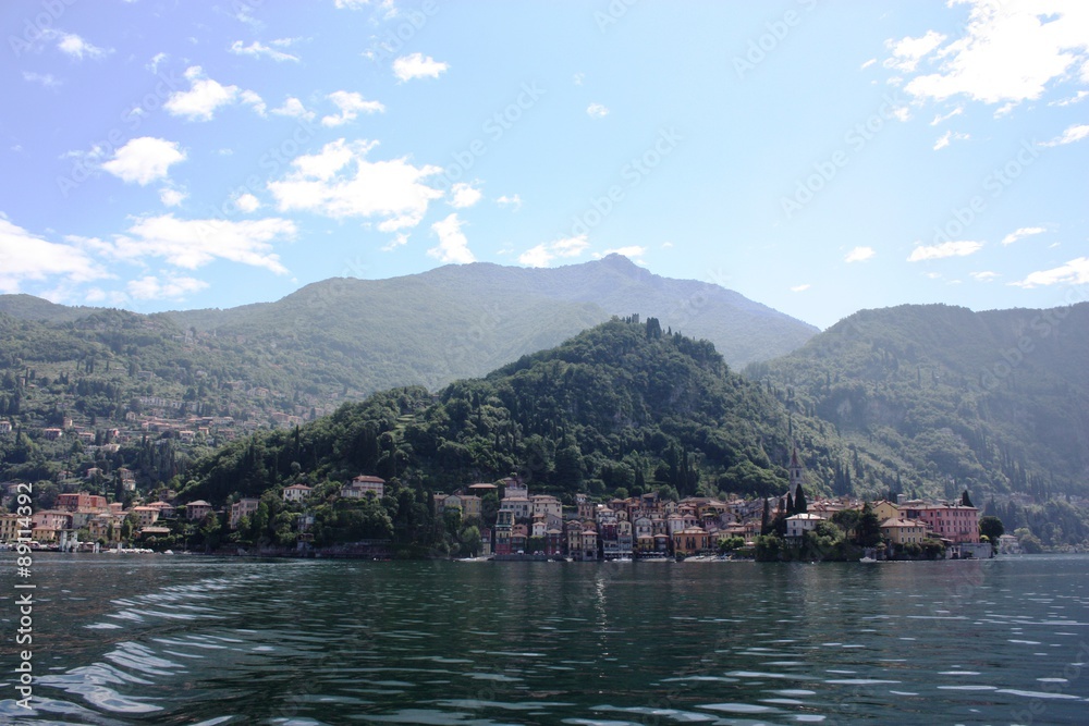 View towards Varenna at the Lake Como under blue sky in Lombardy Italy 