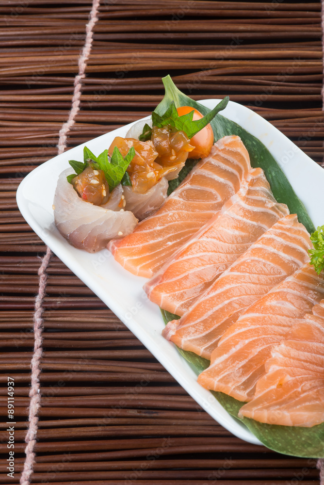 japanese cuisine. sashimi on the background japanese cuisine. sashimi on the background