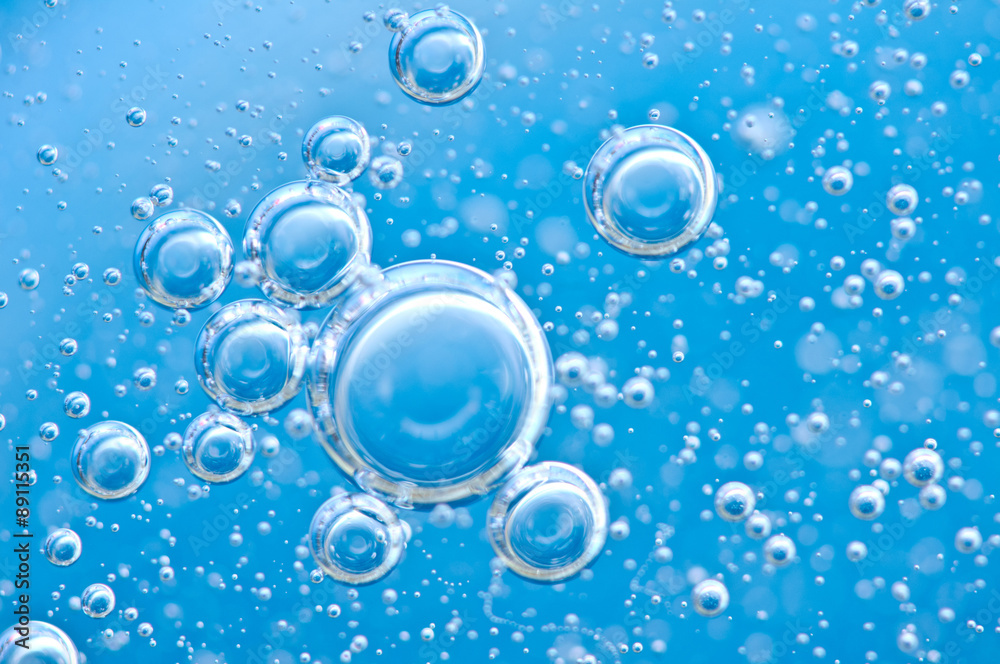 Macro Oxygen bubbles in blue clear water Macro Oxygen bubbles in blue clear water