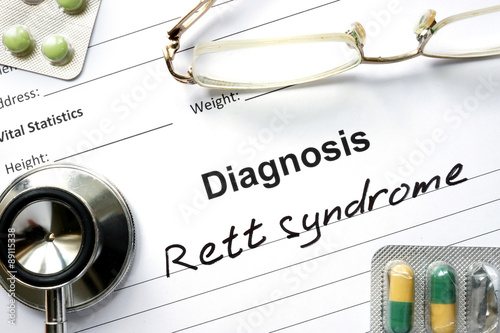 Diagnosis Rett syndrome, pills and stethoscope. photo