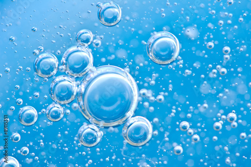 Macro Oxygen bubbles in blue clear water