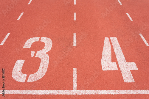 Obraz na płótnie Athletics track lane number three and four w salonie