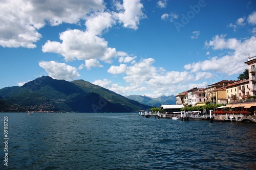 Bellagio lakefront on the shores of Lake Como under blue sky in Lombardy Italy  © ClaraNila