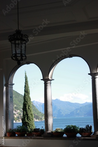 Window overlooking to Lake Como in Lombardy, Italy