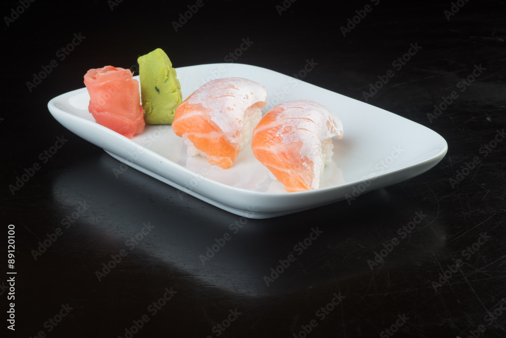 japanese cuisine. sushi salmon on the background japanese cuisine. sushi salmon on the background
