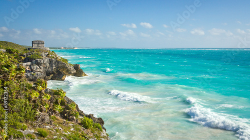 Ancient Mayan ruins in Tulum on the beach of Caribbean turquoise sea 