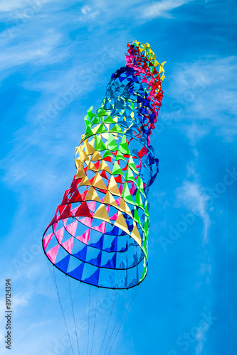 Kite flying on the blue sky