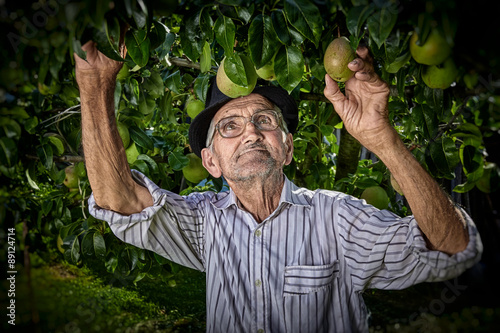 Wrinkled and expressive old farmer