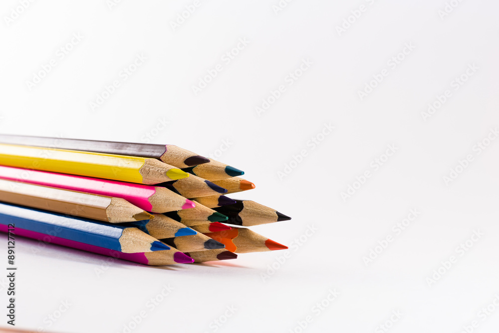 Multicolored Pencils on White Background Multicolored Pencils on White Background