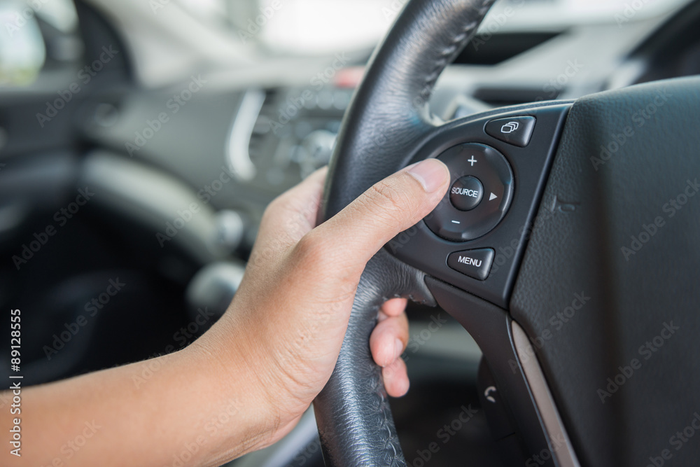 control button on the car steering wheel