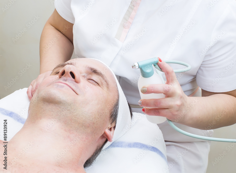 man in a beauty salon facial and massage