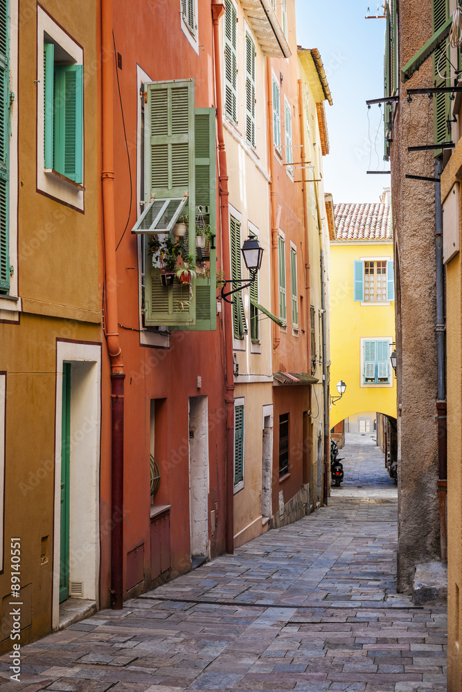 Bright houses on old street in Villefranche-sur-Mer