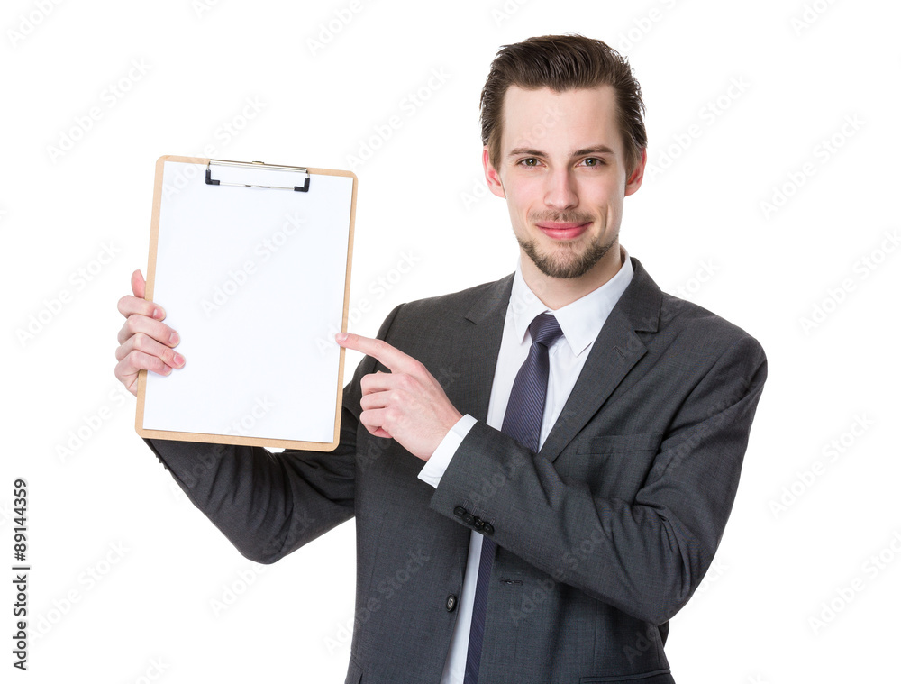 Handsome businessman finger point to clipboard Handsome businessman finger point to clipboard