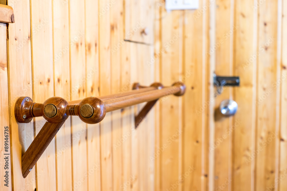 wood clothes line in wooden room wood clothes line in wooden room