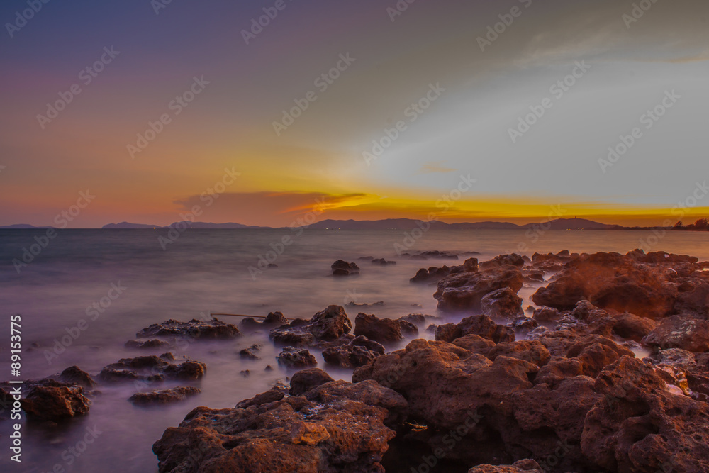 Fototapeta premium Rocky beach at sunset