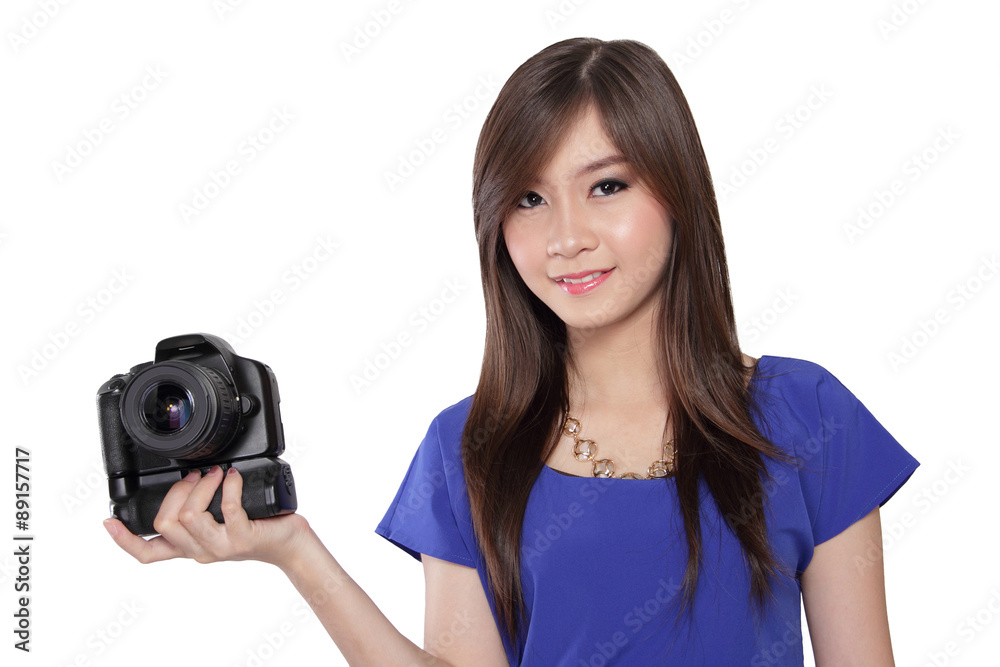 Beautiful young Asian woman holding a camera. Beautiful young Asian woman holding a camera.