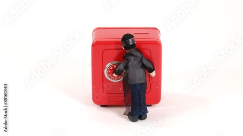 Claymation burglar breaks into vintage toy safe. photo