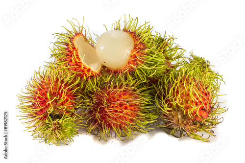 Red rambutan sweet delicious fruit isolated on white background