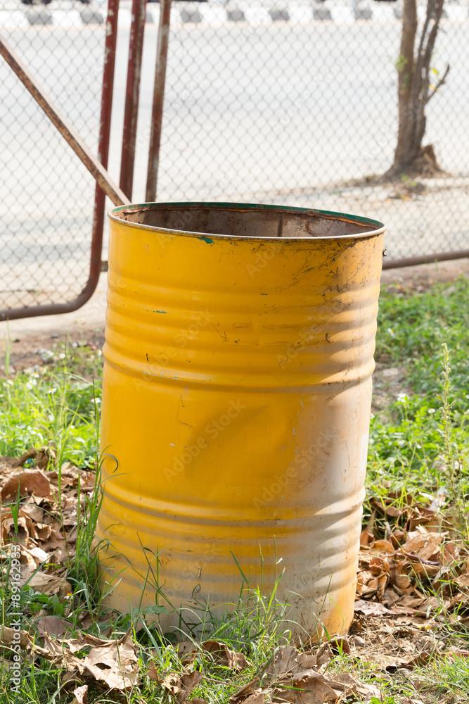 yellow trashcan of recycle old fuel tank