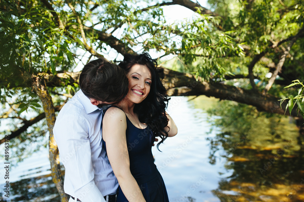 Fototapeta premium man and woman at the lake