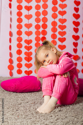 little girl in pink trendy sportswear