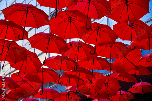 Red Umbrellas In the Air