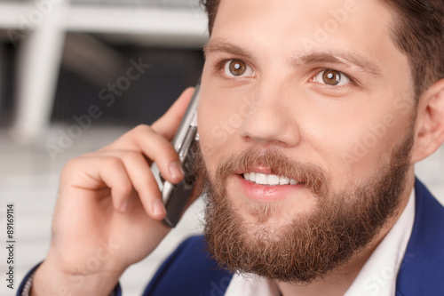 Close up of man talking per cell phone