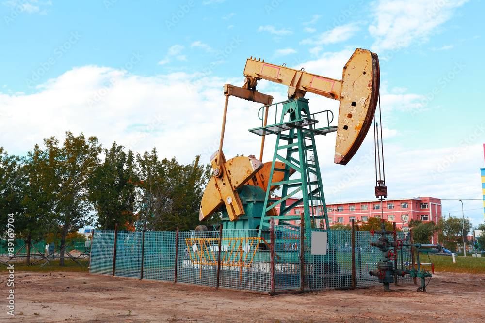 Golden yellow Oil pump of crude oilwell rig Golden yellow Oil pump of crude oilwell rig